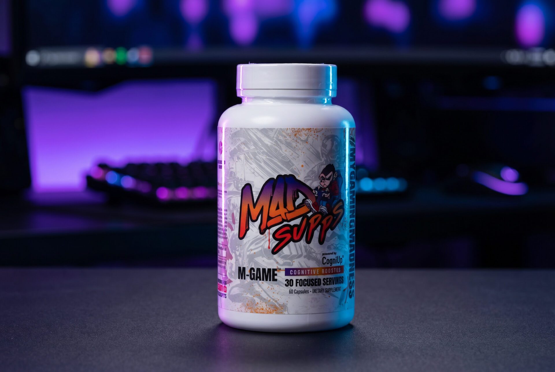 M-game in front of a PC with RGB light in the background